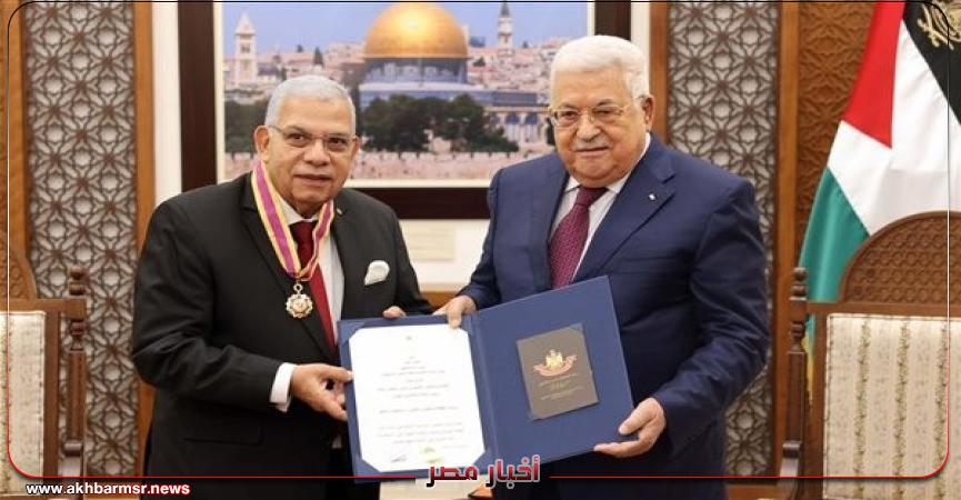 الرئيس الفلسطيني ومحمد رشاد