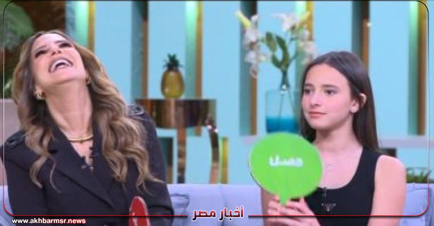 إيمان العاصى وابنتها